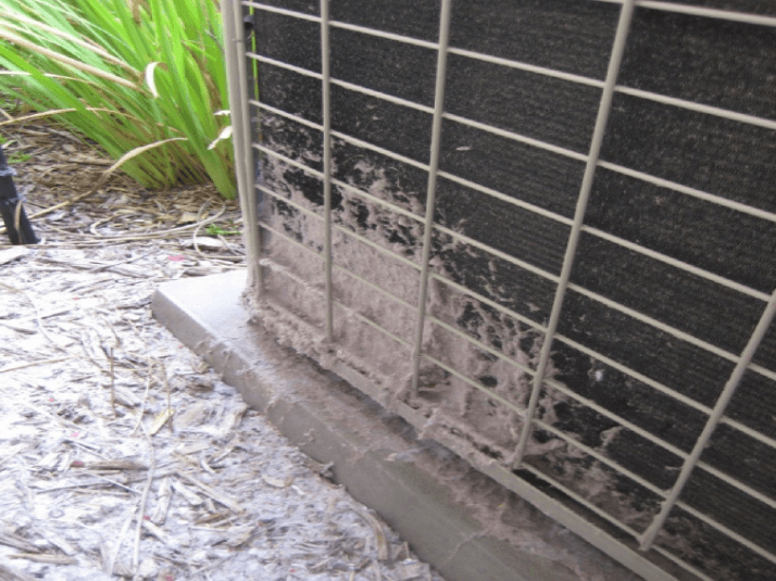 Part 1 of 2 figures- Figure 1 showing noncompliant condensing unit clearance from a dryer vent